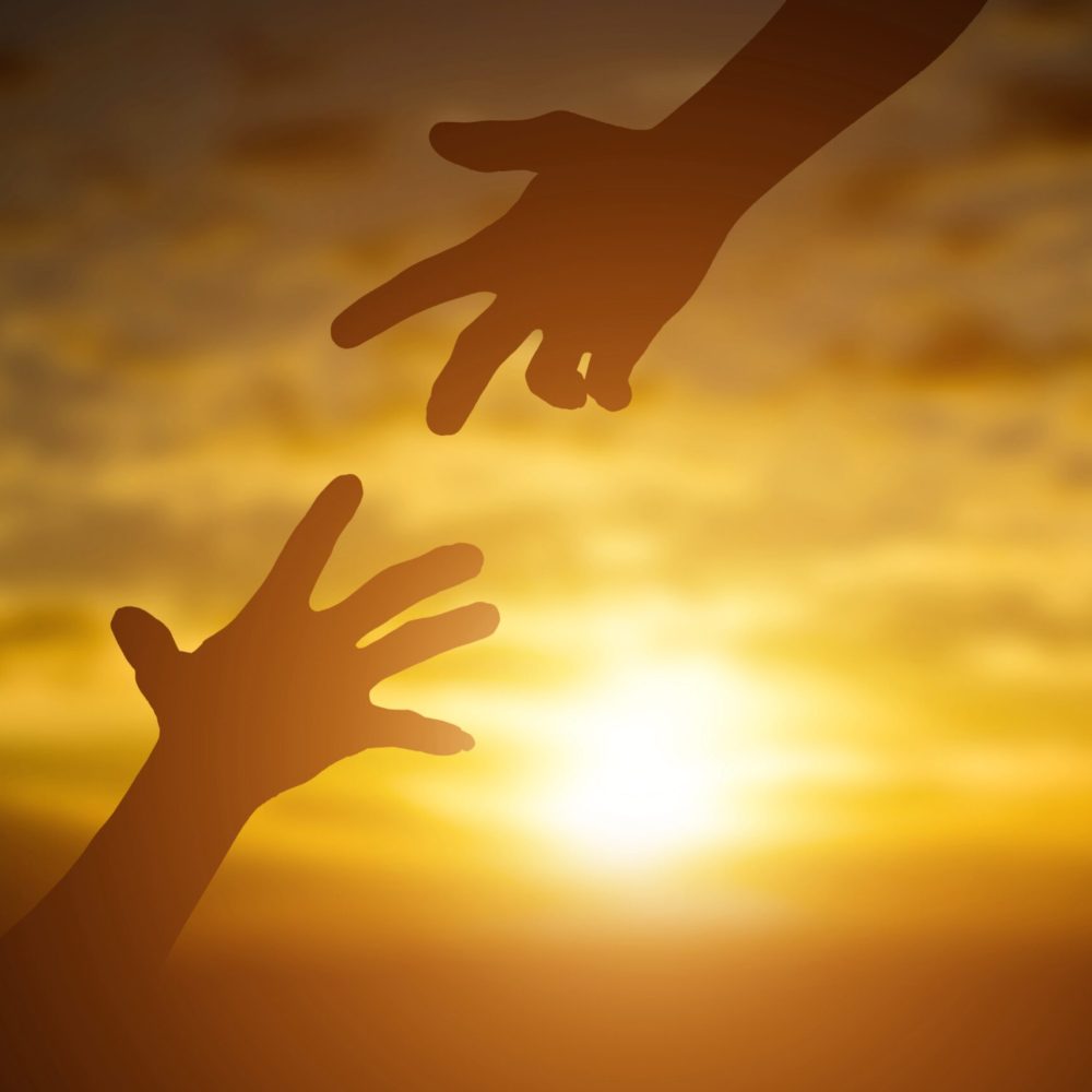 silhouette-of-giving-a-help-hand